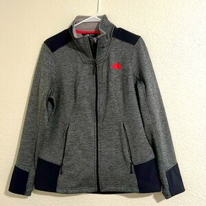 North Face zip up jacket.